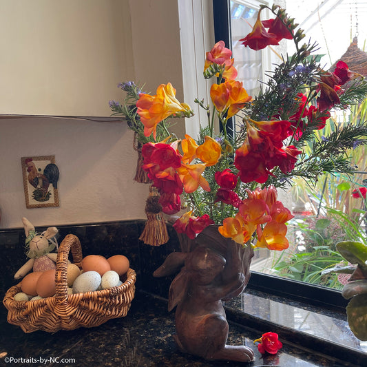 freesias in bunny vase