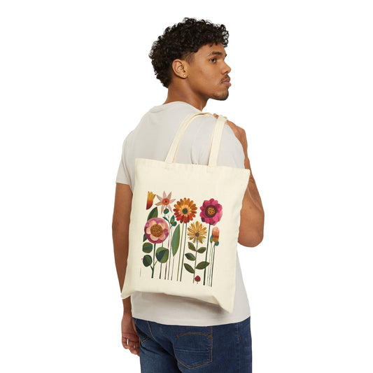 Man carrying a tote bag with floral design on a white background