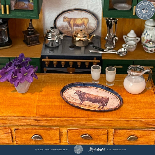 dark brown cow vintage tray on kitchen island