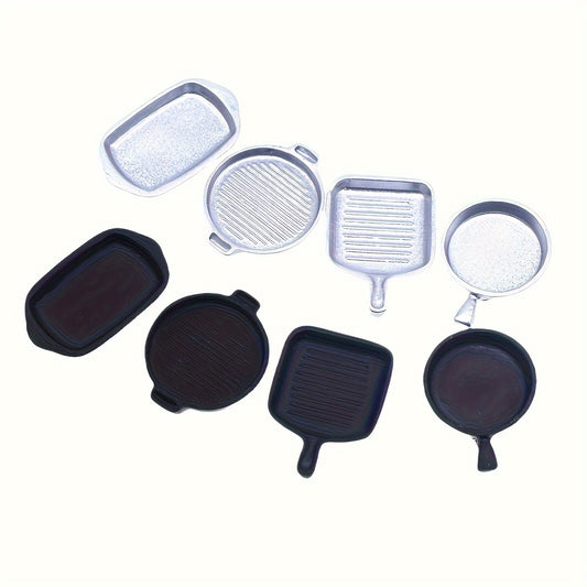 Upgrade your dollhouse kitchen with this 4-piece set of realistic miniature frying pans! Perfectly sized at 1:12 scale, these pans will add a touch of charm and authenticity to your dollhouse. (Warning: may cause dollhouse envy in others!) in black and silver