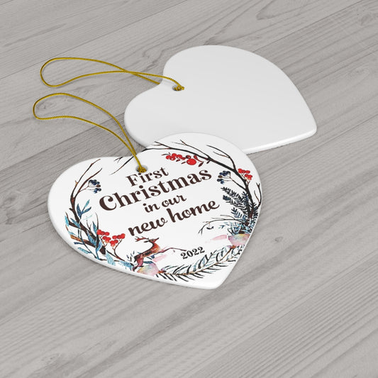 First Christmas In Our New Home Heart Ornament on table