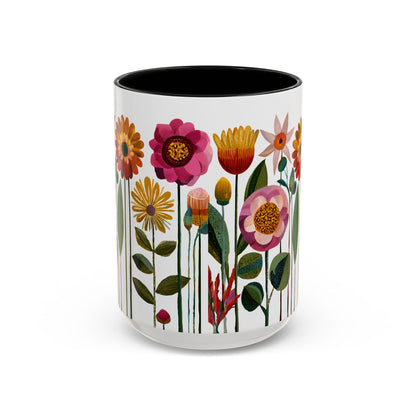 Mug with floral design on a white background with black handle and interior.