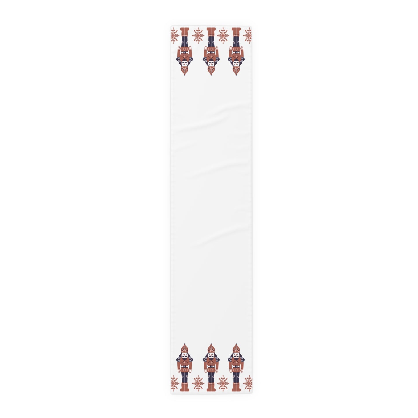 White table runner with decorative nutcracker pattern on a white background