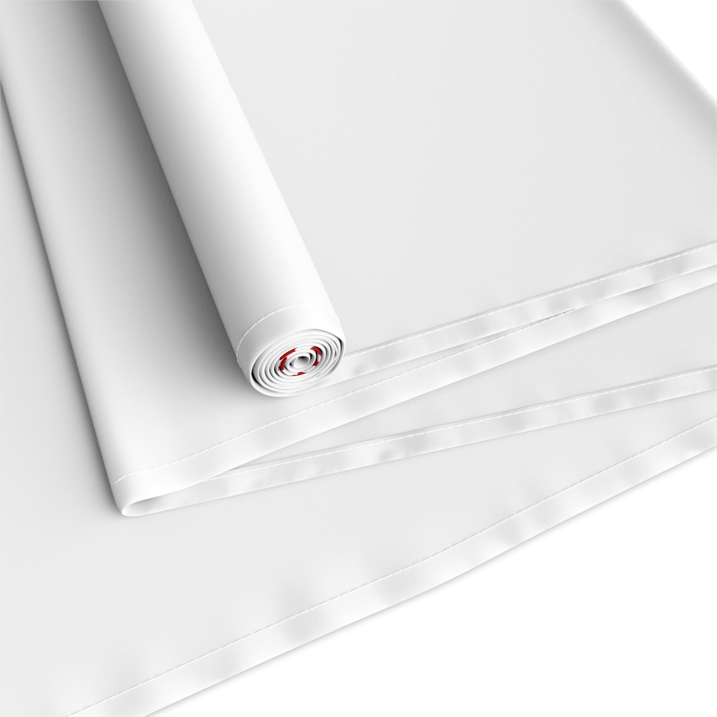 Roll of white  fabric on a light gray background