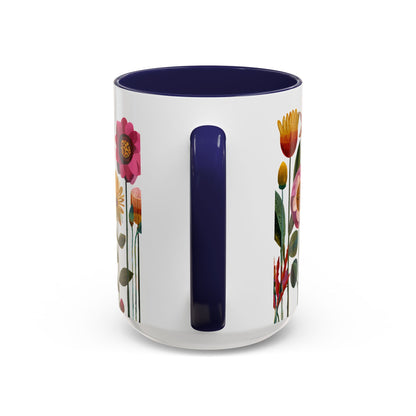 Blue and White 15 oz mug with floral designs and a blue handle on a white background