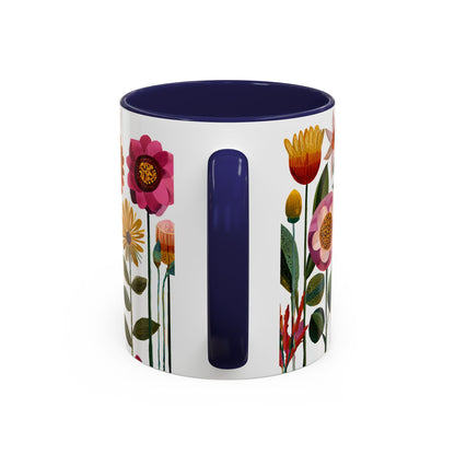 Mug with floral design and blue interior and handle on a white background
