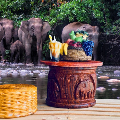 African Safari Inspired Wooden Tables with Elephant Carvings in situ