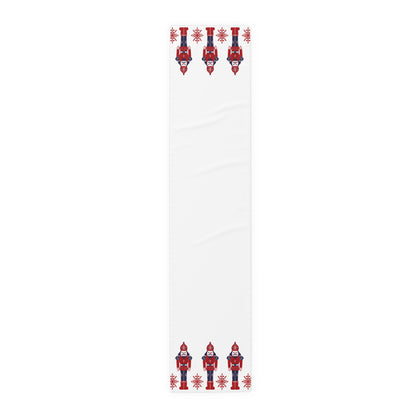 White table runner with red and blue decorative elements on a white background