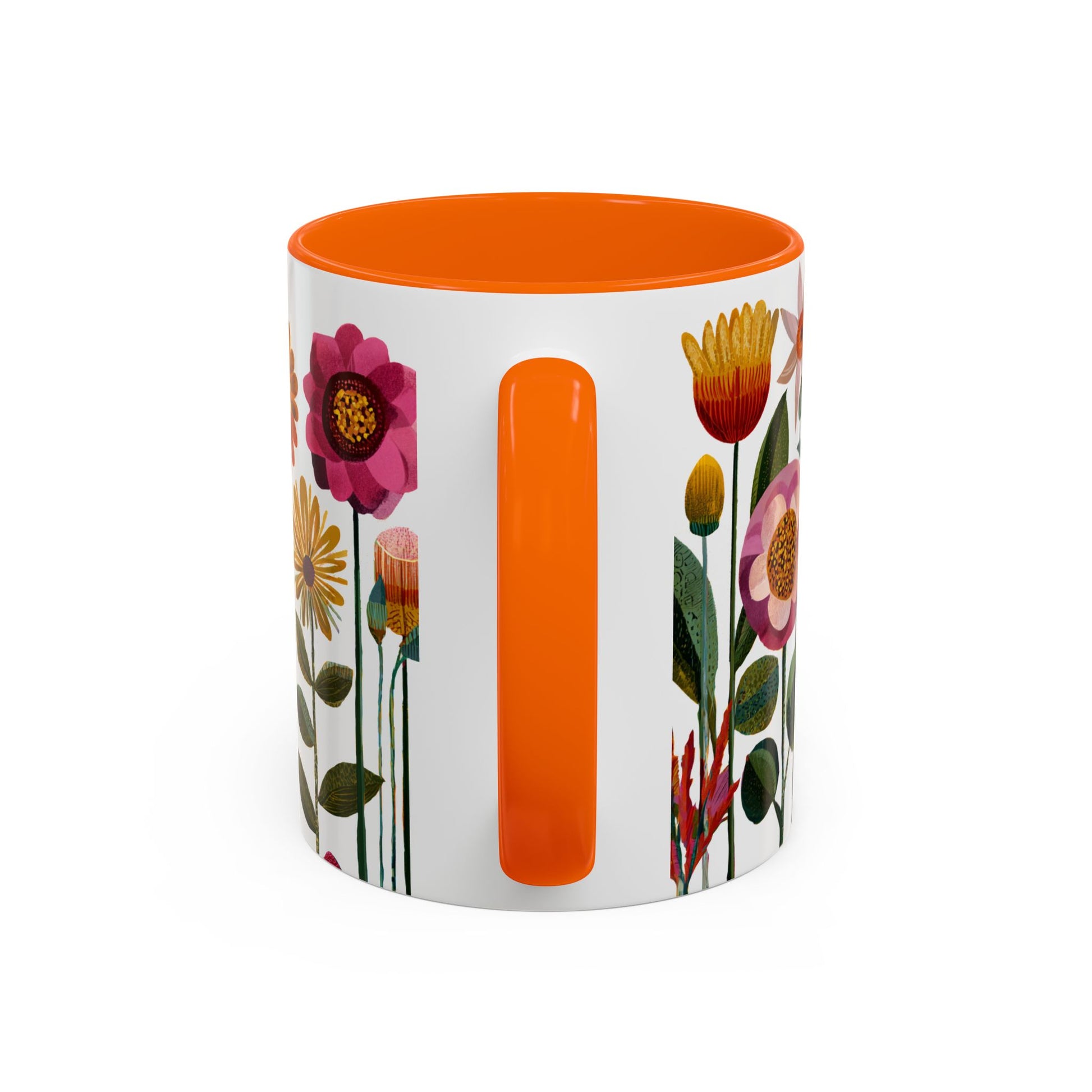 Mug with floral design and orange handle and interior on a white background