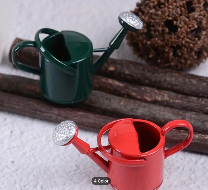 red and green watering can