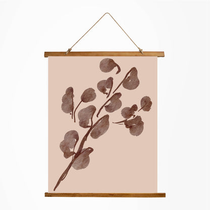 Decorative wall hanging with brown leaf pattern on a beige background
