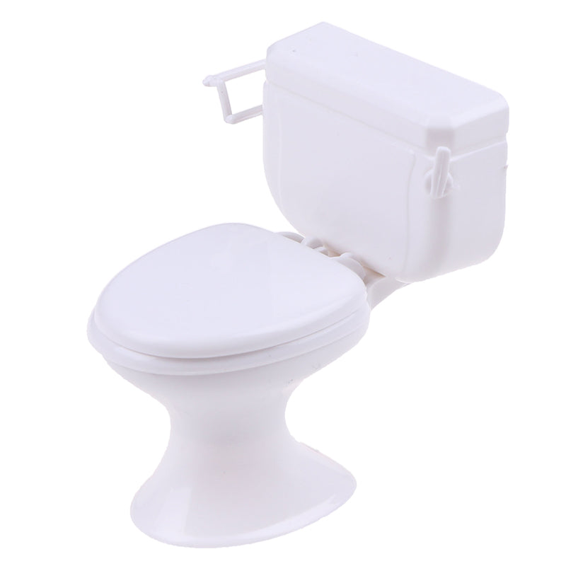 White dollhouse toilet handle view