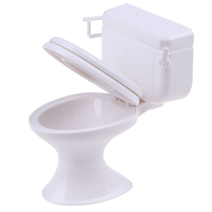 White dollhouse toilet open lid