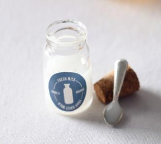 milk jar with spoon