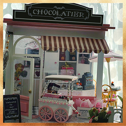 Le diorama miniature du chocolatier avec cache-poussière